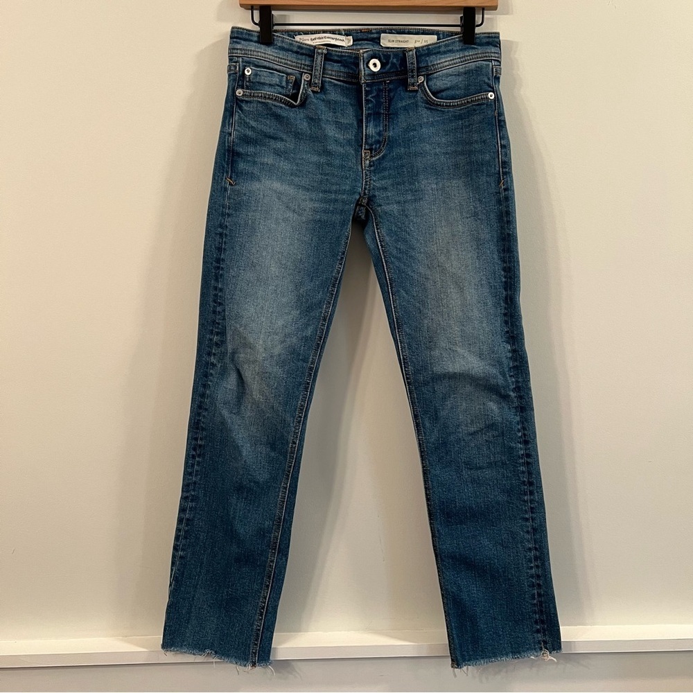 Women’s Anthropologie Pilcro medium wash raw hem slim straight jeans size 25